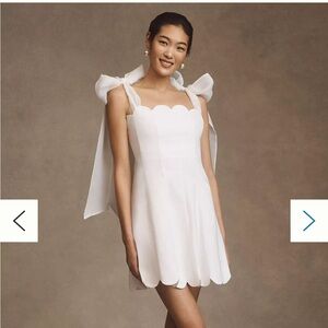 BHLDN XS IZZY BOW SCALLOP A LINE MINI DRESS anthropologie